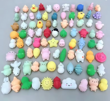 Reference photograph of the assorted mini animal squishies included in the 50-piece pack